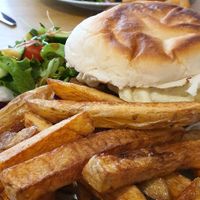 Burgers with macaroni cheese and stan bacon and those amazing chips! at Potato Tomato - The Eatery in Whitstable