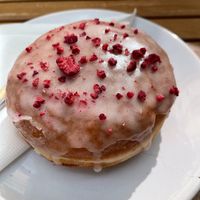 Vegan raspberry donut at Donut Shop in Prague
