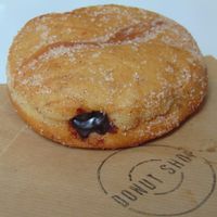 Vegan chocolate filled donut at Donut Shop in Prague