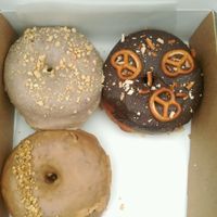 chocolate with pretzels, chai and peanut donuts at Donut Shop in Prague