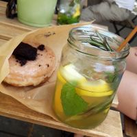 Lemon-brownie donut plus homemade ice tea at Donut Shop in Prague