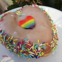 heart-shaped Pride donut, vanilla flavor at Donut Shop in Prague