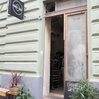 Big location with seatings outdoor and indoor at Donut Shop in Prague