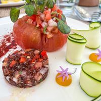 Tomato filled with pico de gallo and black quinoa with mallorcan
almond dukkah and water cress  at Cal Reiet's Table in Mallorca
