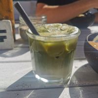 Iced matcha latte with oat milk at Nalu Bowls in Ericeira