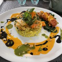 Self-made vegan sausage, with sautéed veggies and turmeric rice  at Annadata in Saint-malo