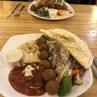 Falafel plate with hummus and house eggplant at Falafel King in Boulder