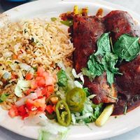 Veggie enchiladas (no cheese) with ranchero sauce at Chuy's in Katy