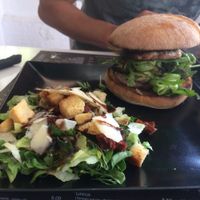 Vegetarian halloumi burger with mushroom, zucchini, onion and salad. Salad with sundried tomatoes, crutons, parmesan etc at Antonio Pizza & Pasta in Rhodes