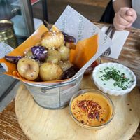 Las patatas chulapas son obligatorias at Superchulo in Madrid