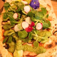 Rainbow pizza at Superchulo in Madrid