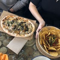 Pizza and nachos, fine. at Superchulo in Madrid