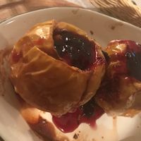 Baked apple with berrie jam and nut filling at Propaganda  in Chisinau