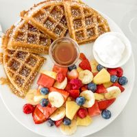 Delicious gluten free and vegan yummy yummy fruit salad with vegan coconut yogurt and maple syrup.  at Waffle on Cairns in Cairns