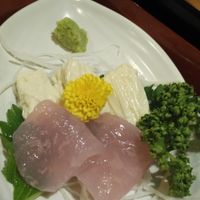 Two varieties of vegan sashimi: yuba and konyaku, served with a little wasabi. The fish-looking sashimi is made from konyaku (a type of yam) and is chewy. at Bell Cafe in Nikko