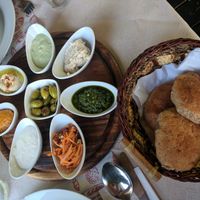 Variety of homeade spreads and dips served with fresh bread at El Galil in Amirim