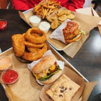 eden burger with onion rings and a s’mores blonde, and the bbq western burger (on a pretzel bun) with fried pickles and fries!  so yum!!! at E Burger in Columbus