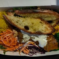 Bli Buddha (lettuce, spinach, arugula, blanched broccoli, carrot, cabbage, roasted pumpkin, cous cous, hummus, grilled tofu, chickpeas, green lentils, vegan salad dressing, bread at Kynd Community - Seminyak in Seminyak