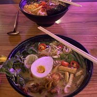Laksa and Spicy Ramen (in the back) at Kynd Community - Seminyak in Seminyak