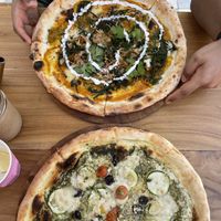 Pesto pizza on bottom (can’t remember top)  at Kynd Community - Seminyak in Seminyak