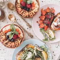 Vegan smoothie bowls and three different kind of toasts  at Kynd Community - Seminyak in Seminyak