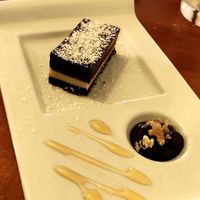 LA JOCONDE Vegan

Whole cocoa almond crust, coconut, coconut sugar, coffee, agave, white almond caramel with maple syrup at La Cour des Anges in Colmar