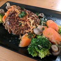 Lentil galettes with steamed veggies at La Cour des Anges in Colmar