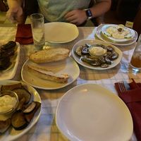 Fried eggplant, fried zucchini, vegan tzatziki, stuffed wine leaves, garlic bread  at Sagittarius Restaurant in Kos