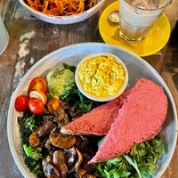 Sourdough toast, mushrooms and scrambled tofu.  at Buddha Bowl Cafe in Newtown