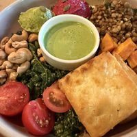 Balance Bowl. Toasted tofu / lentil salad / sweet potato / beetroot hummus / avocado / kale / cashew nuts / cherry tomatoes / herbed tahini dressing. (GF)  at Buddha Bowl Cafe in Newtown