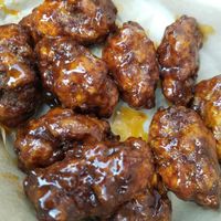 house-made vegan wings tossed in Sriracha lime sauce, served with vegan ranch dip at Twincade in Griffith