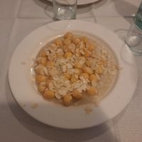Gnocchi di zucca con formaggio fuso e mandorle at Pizzeria 4s in Cividale Del Friuli