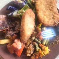 Assortment of delicious fooood? hash brown, eggplant, beans, tempe, and a sweet and sour dish at Evergreen Vegetarian House 长青素食之家 in Penang