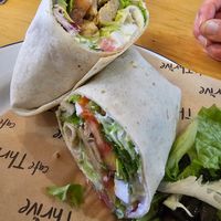 Chick'n pesto and feta wrap with salad at Cafe Thrive in Southampton