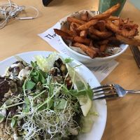 Amazing healthy bowl - sweet potato fries - and fresh super green smoothie - Yum! at Cafe Thrive in Southampton