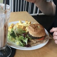 Lentil burger with chips and milkshake at Cafe Thrive in Southampton