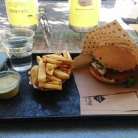 Vienna burger, french fries and Basilikum-Lemon dip. Free water. at Swing Kitchen - Kaiserfeldgasse in Graz