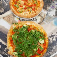 upper one: "vege-pizza" with vegan cheese, down one: "vegan pizza" at Pizzeria Gallus in Bled