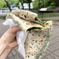 The hot Jengyalov Hac, just out of the oven! Juicy and HUGE! This portion is for one, and it's like two lunches! at Jengyalov Hac in Yerevan