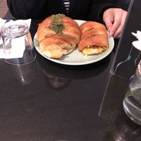 Pistachio croissant and a cheese mini pizza at Veginity in Dublin