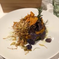 Pumpkin timbale with lentil ragout flavored with thyme and served on a bed of chard - Vegan/GlutenFree at La Piazzetta in Verona