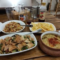 Cabbage salad, fries, lentil soup, fattoush at Zatar Pizza in Yerevan