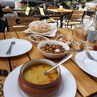 Lentil soup, Armenian salad, hummus, aubergine dip and bread at Zatar Pizza in Yerevan