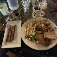 VEGAN Tofu Scramble with sweet potato hash and wheat toast with vegan butter and a side of vegan sausage. Coffee/with oat milk and a lemonade   at Julian's in Providence
