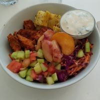 Buddha bowl (vegan steak, vegetables, peach, carrots, tomatoes , vegan yogurt dressing) at Comptoir Veggie in Paris