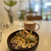 Açaí bowl and oat milk latte  at Comptoir Veggie in Paris