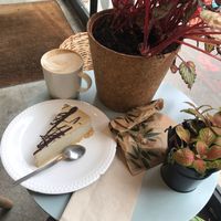 Latte, peanut butter cheese and cookie (in the paper bag) at Comptoir Veggie in Paris
