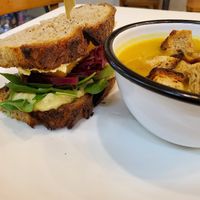 Chickpea salad/tofu sandwich and squash soup with croutons at Comptoir Veggie in Paris