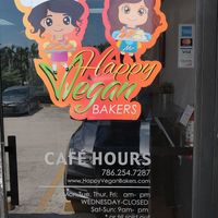 Information on the door. at The Happy Vegan Bakers in Hialeah