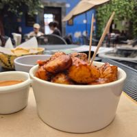Spicy baked potatoes with Chipotle sauce at Tacogreen in Queretaro